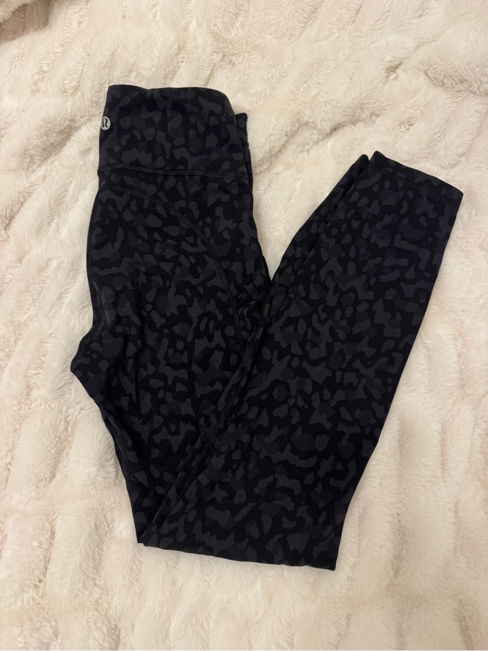 Lululemon Black Animal Print Leggings with pockets on both sides